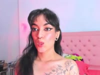 Hey, I’m the girl with the tattoos who loves to play. Whether I’m lounging in a cute outfit or getting sexy in black lace, I love exploring that space between sweet and wild. I’m here to let you into my world for a good time, with a little bit of spice and a lot of attitude.